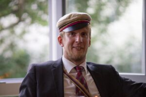 Porträtbild von Matthias Klausing in Couleur der Burschenschaft Germania Jena