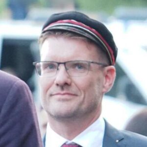 Porträtbild von Henning Kläfker mit Mütze der Burgkeller-Burschenschaft